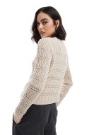 knitted cardigan with toggle buttons in cream