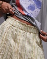cotton flippy mini skirt with godets in yellow and green stripe